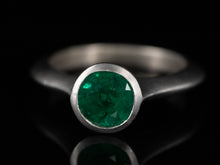  Emerald Solitaire Ring in 18K White Gold