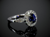 Blue Sapphire and Diamond Halo Ring in 18K White Gold