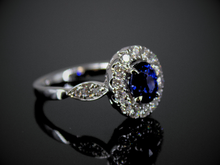  Blue Sapphire and Diamond Halo Ring in 18K White Gold