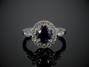 Blue Sapphire and Diamond Halo Ring in 18K White Gold