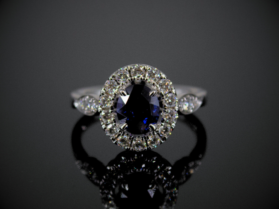 Blue Sapphire and Diamond Halo Ring in 18K White Gold