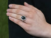 Blue Green Sapphire and Diamond Halo Ring in 18K White Gold