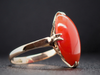 Elongated Oval Red Coral Solitaire Ring in 14K Yellow Gold