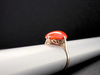 Elongated Oval Red Coral Solitaire Ring in 14K Yellow Gold