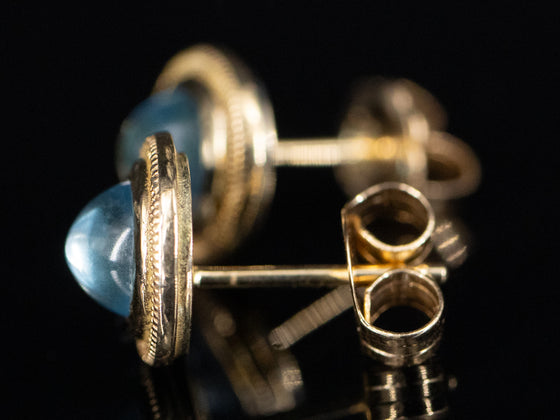 The Nellie Blue Topaz Stud Earrings in 14K Yellow Gold