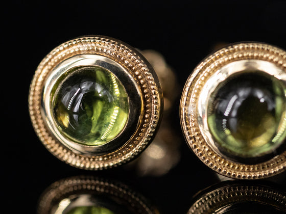 The Nellie Peridot Stud Earrings in 14K Yellow Gold