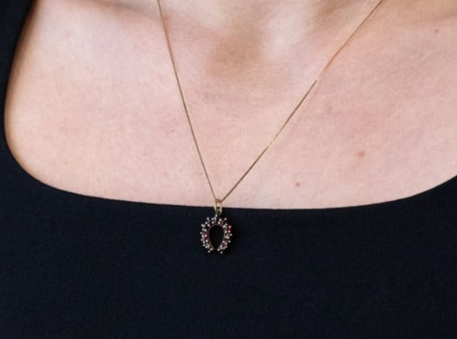 Bohemian Garnet Horseshoe Pendant in Gold Over Silver