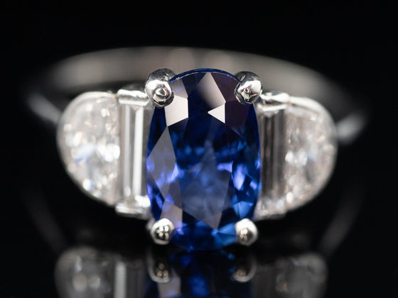 Oval Sapphire and Diamond Accents Ring in Platinum