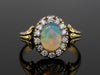 The Helena Opal and Diamond Halo Ring in 18K Yellow Gold