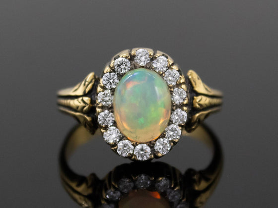 The Helena Opal and Diamond Halo Ring in 18K Yellow Gold