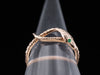 The Serpentine Emerald Snake Band in 14K Rose Gold