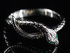 The Serpentine Emerald Snake Band in 14K White Gold