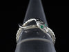 The Serpentine Emerald Snake Band in 14K White Gold